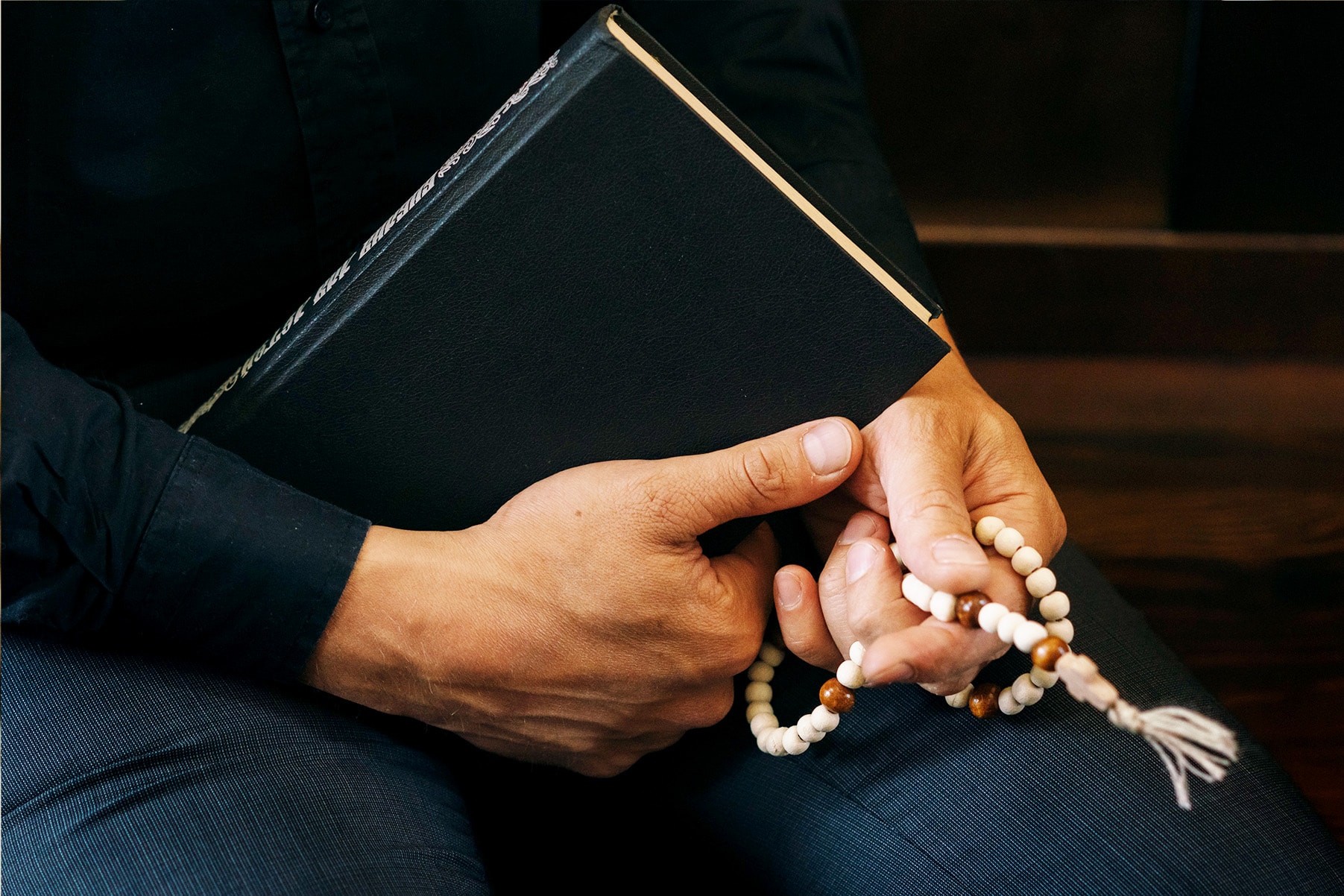 A Person Holding a Bible