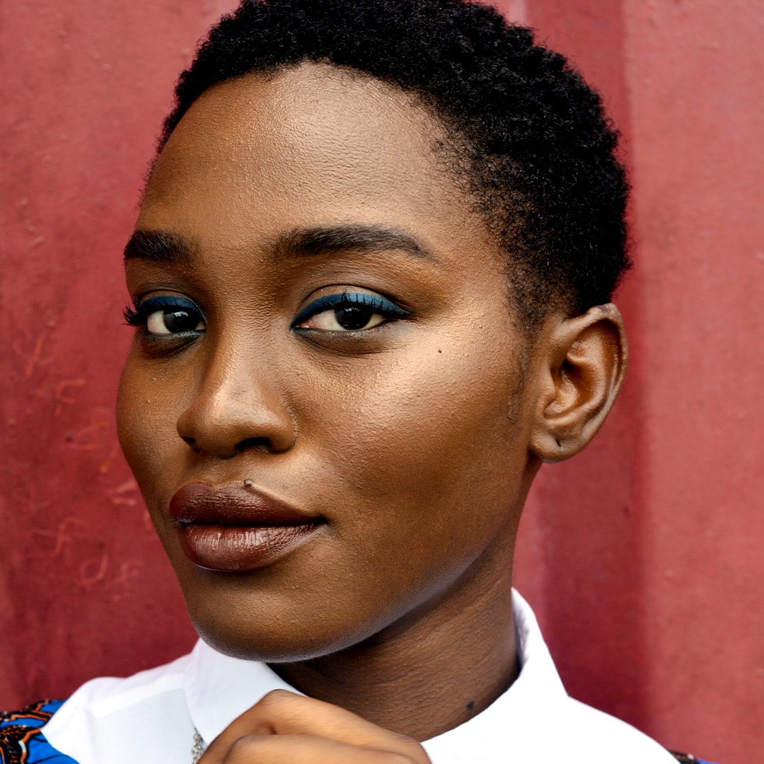 Black woman looking into camera